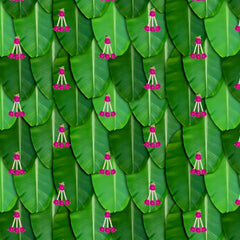 South Indian Backdrop: Texture of Banana leaf with pink rose tassel